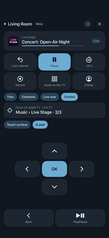 Neverlag’s remote on iPhone, Control area with the D-pad: the Apple TV “Living room” at the top, quick buttons, the mirror line “Music › Live Stage · 2/3”, then arrows with OK, Back and Play/Pause